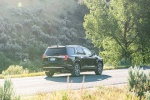2020 GMC Acadia Denali AWD in Carbon Black Metallic - Driving Rear Right View